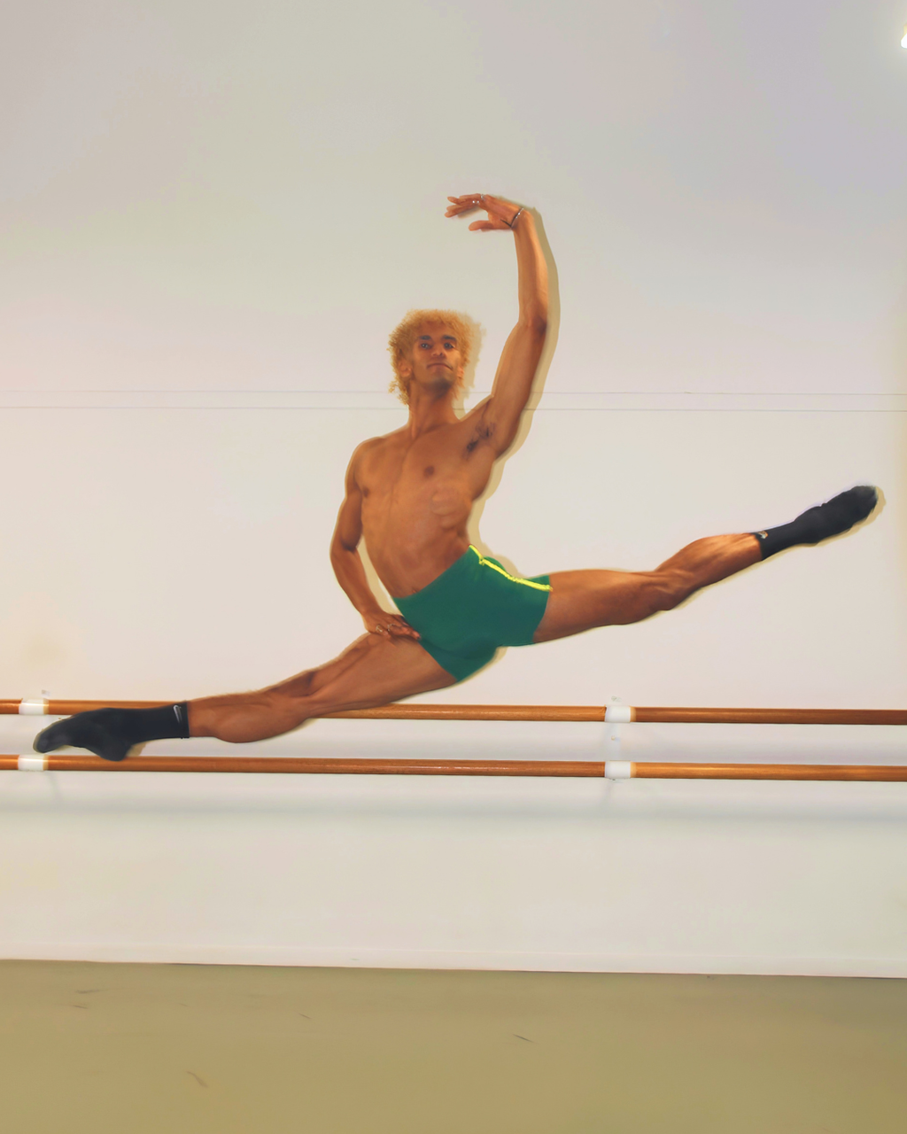 Davi Ramos wearing GENTS Brazil Collection 1/4 shorts In split leap