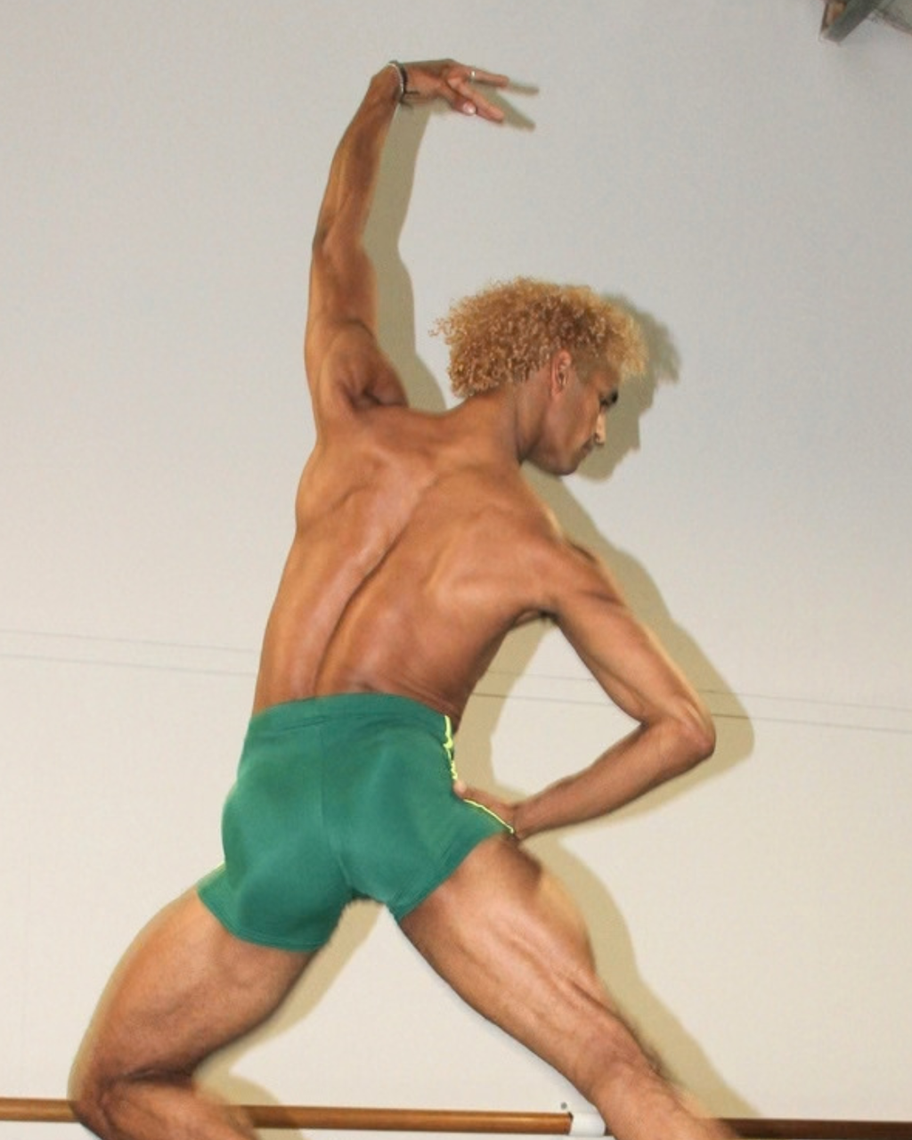 Davi Ramos wearing GENTS Brazil Collection 1/4 shorts close up leap