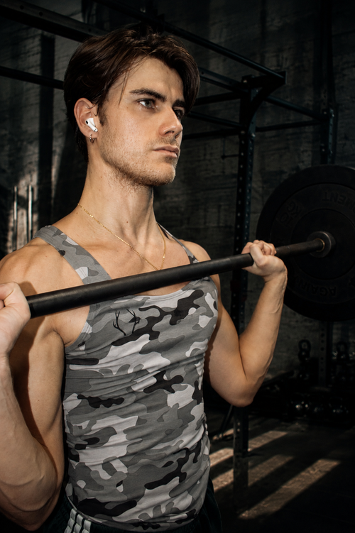 Male ballet dancer in the gym. Ballet singlet